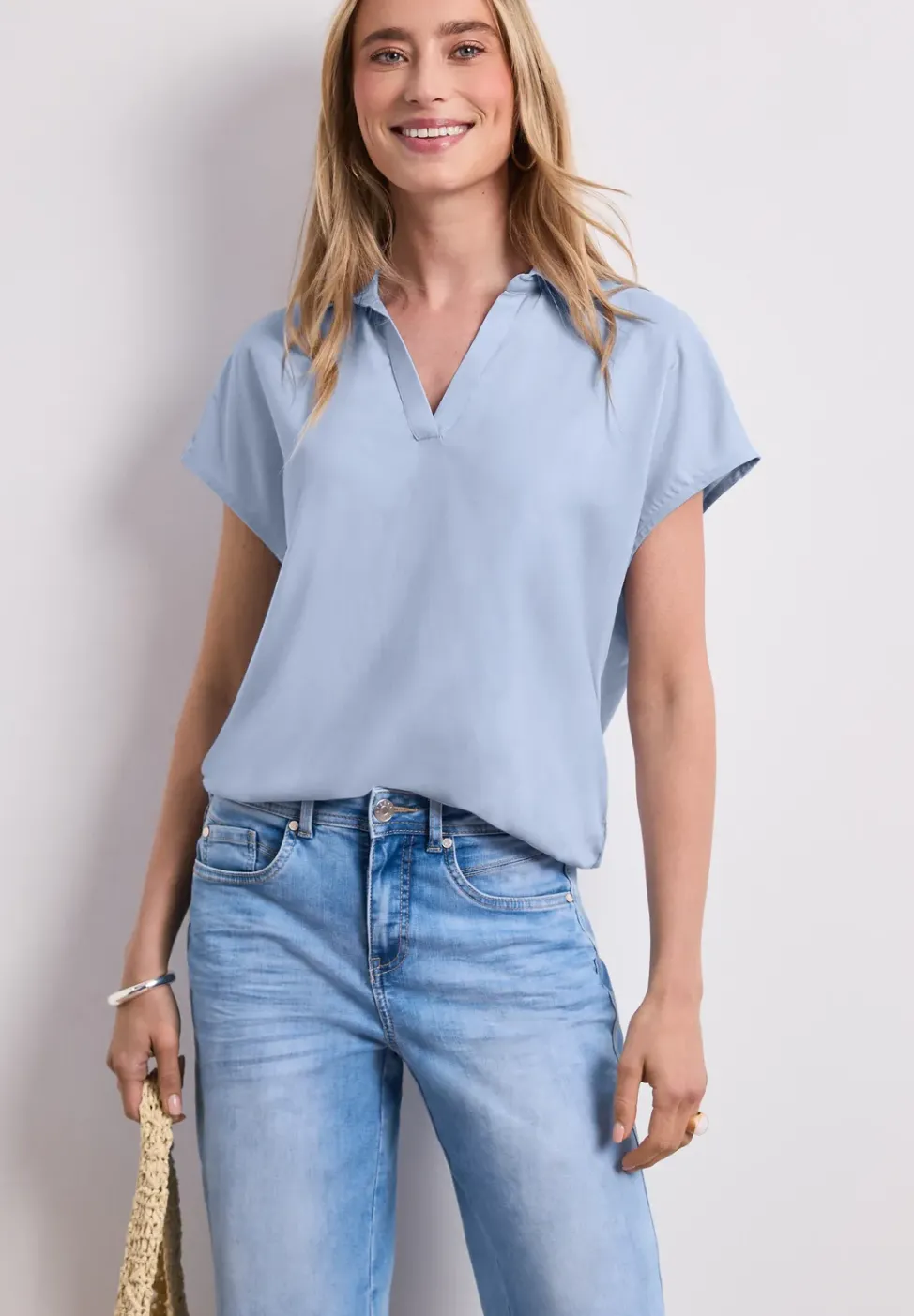 Blouse à col chemise et ourlet élastiqué