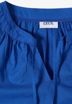 Blouse à manches 3/4 avec col fendu en couleur unie