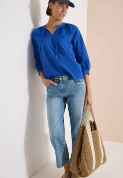 Blouse à manches 3/4 avec col fendu en couleur unie