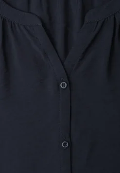 Blouse à manches courtes avec col fendu et boutons