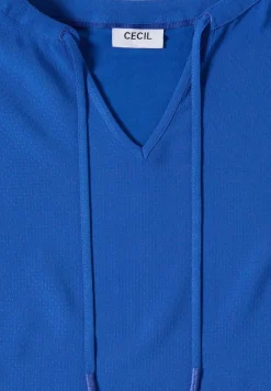 Blouse à manches courtes avec mélange de structures