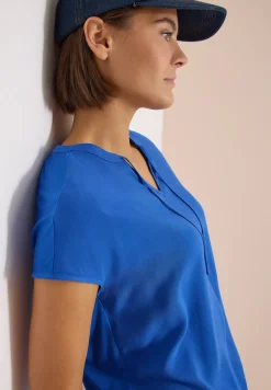 Blouse à manches courtes avec mélange de structures