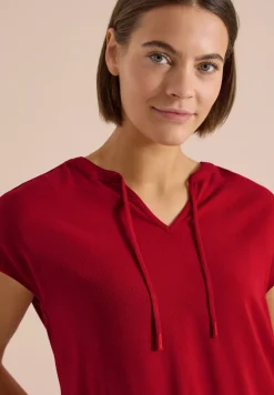Blouse à manches courtes avec mélange de structures
