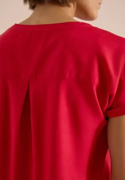 Blouse manches courtes à col fendu