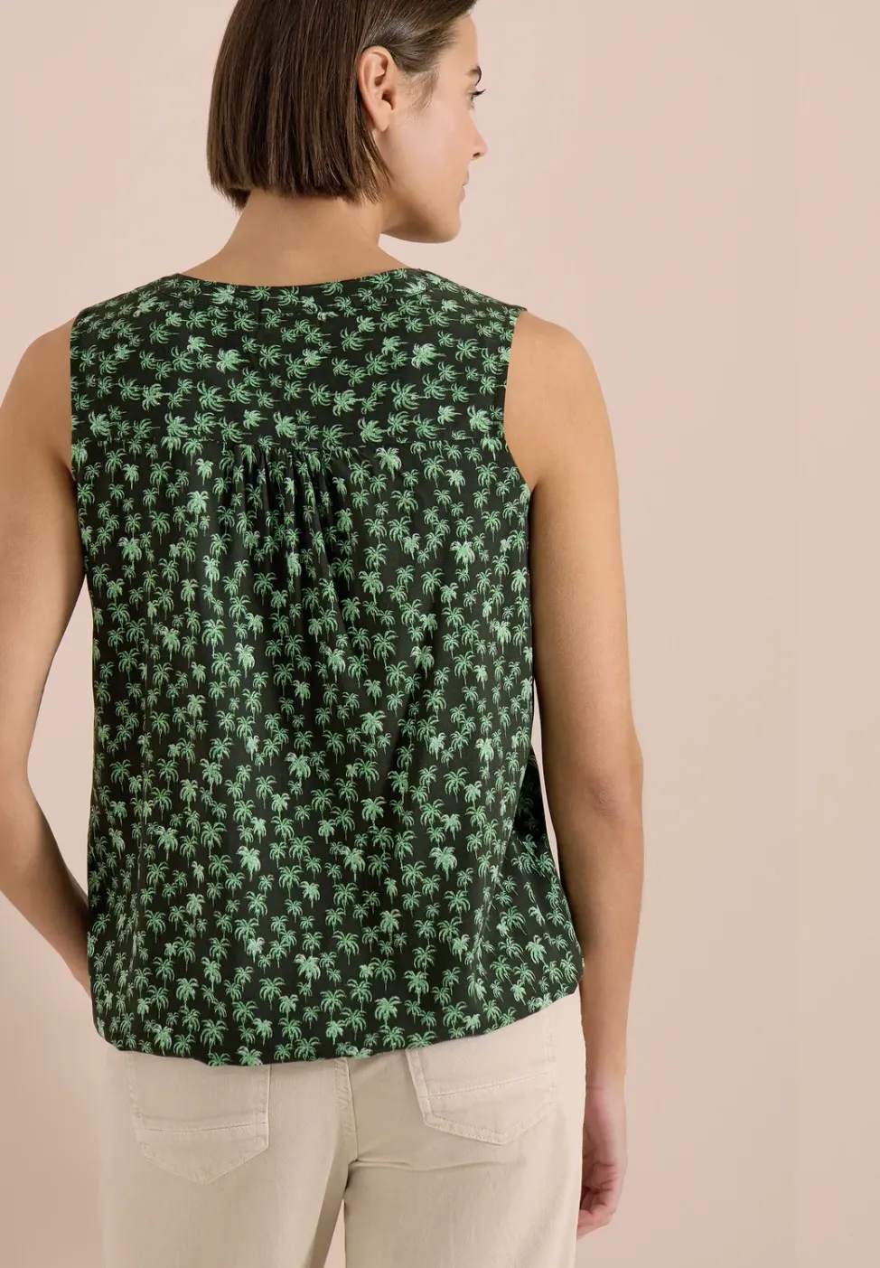 Blouse sans manches à col fendu et imprimé palmiers