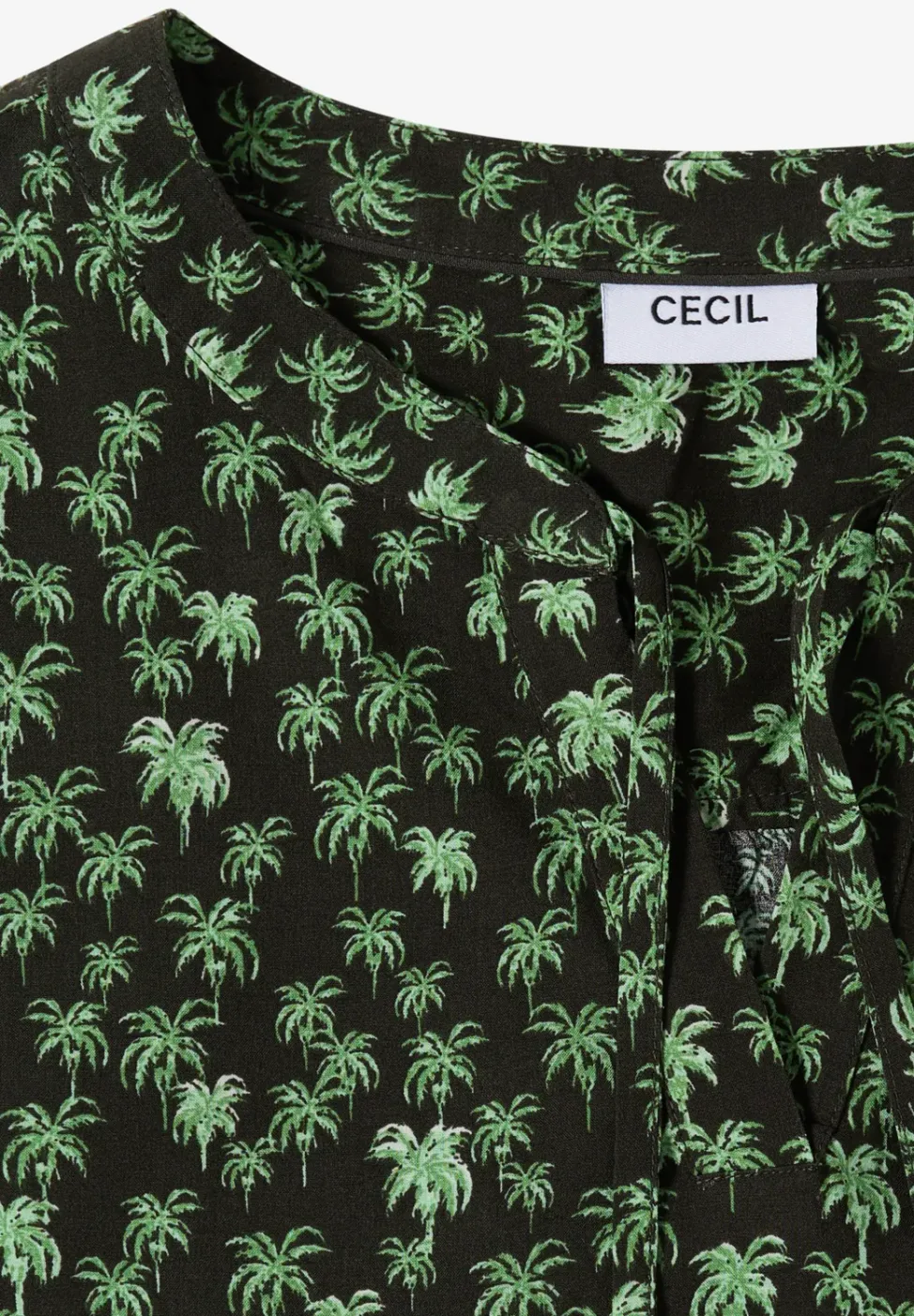 Blouse sans manches à col fendu et imprimé palmiers