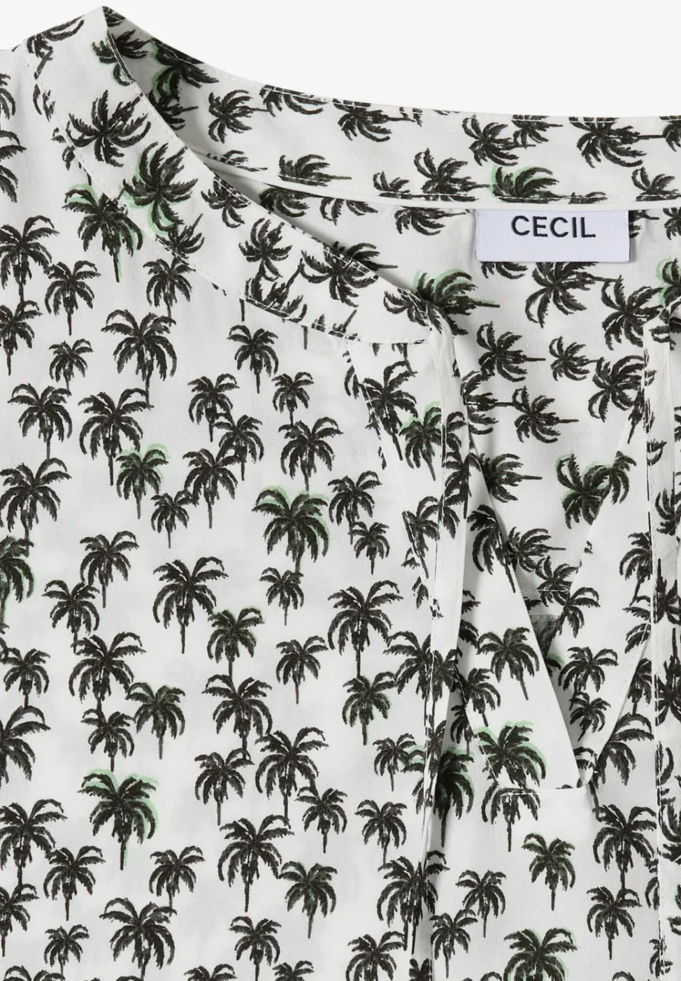 Blouse sans manches à col fendu et imprimé palmiers