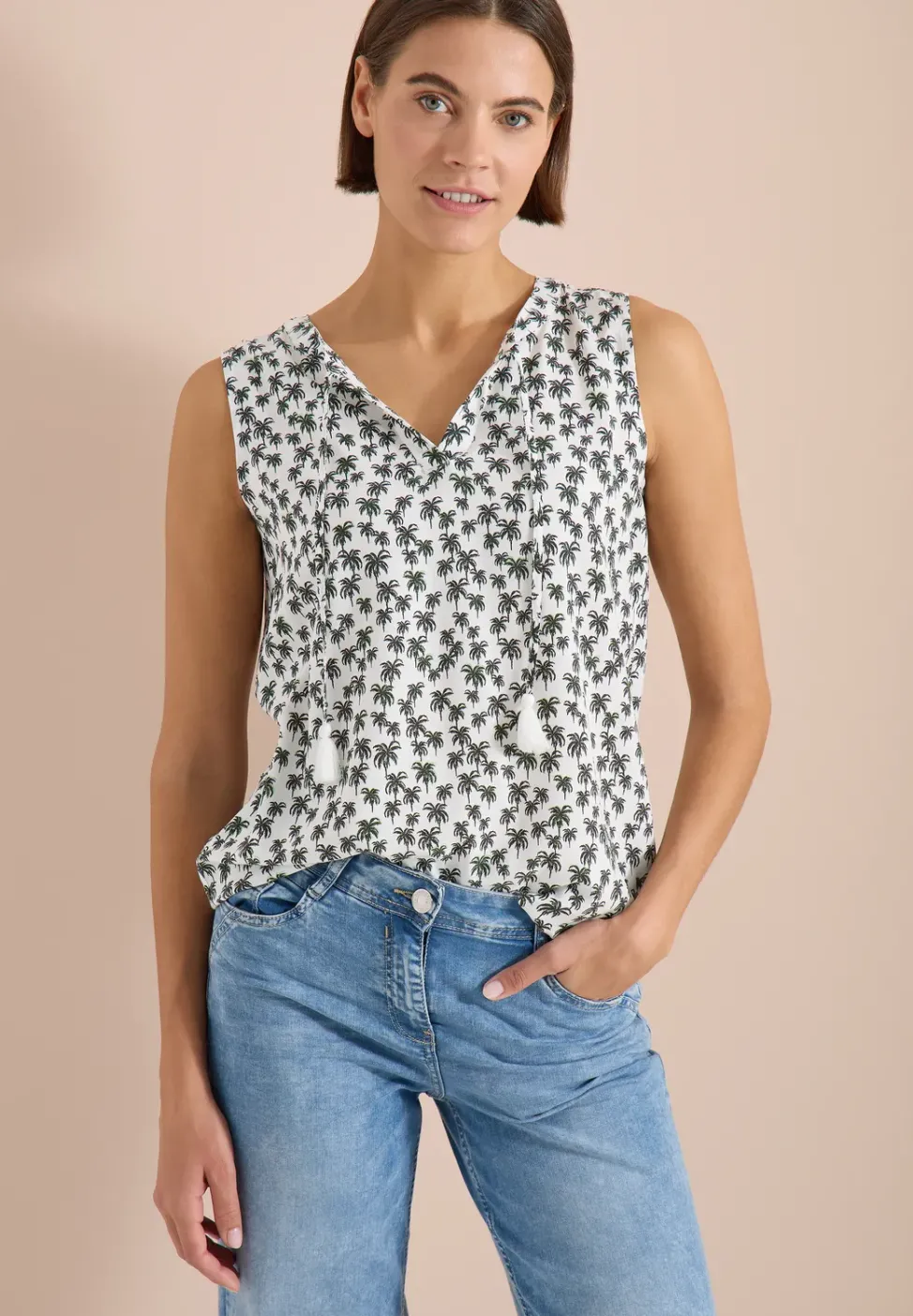 Blouse sans manches à col fendu et imprimé palmiers