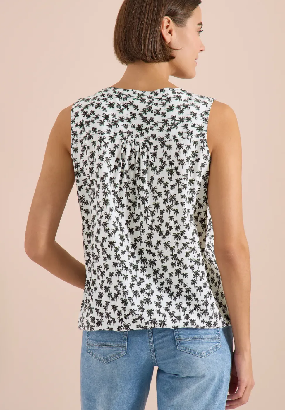 Blouse sans manches à col fendu et imprimé palmiers