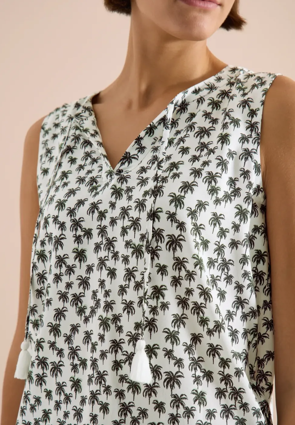 Blouse sans manches à col fendu et imprimé palmiers