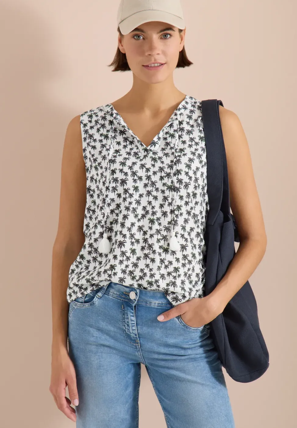 Blouse sans manches à col fendu et imprimé palmiers