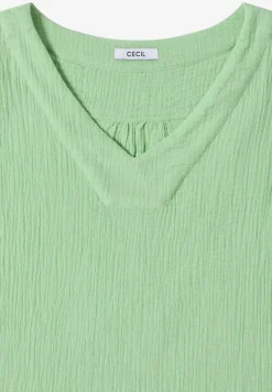 Blouse sans manches col V en mousseline