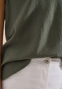 Blouse sans manches col V en mousseline