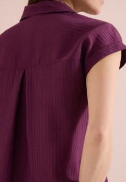 Blouse structurée à épaules tombantes
