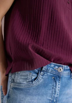 Blouse structurée à épaules tombantes