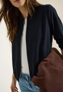 Blouson avec bandes scintillantes