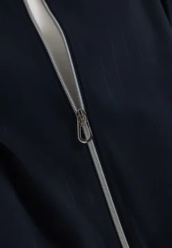 Blouson avec bandes scintillantes