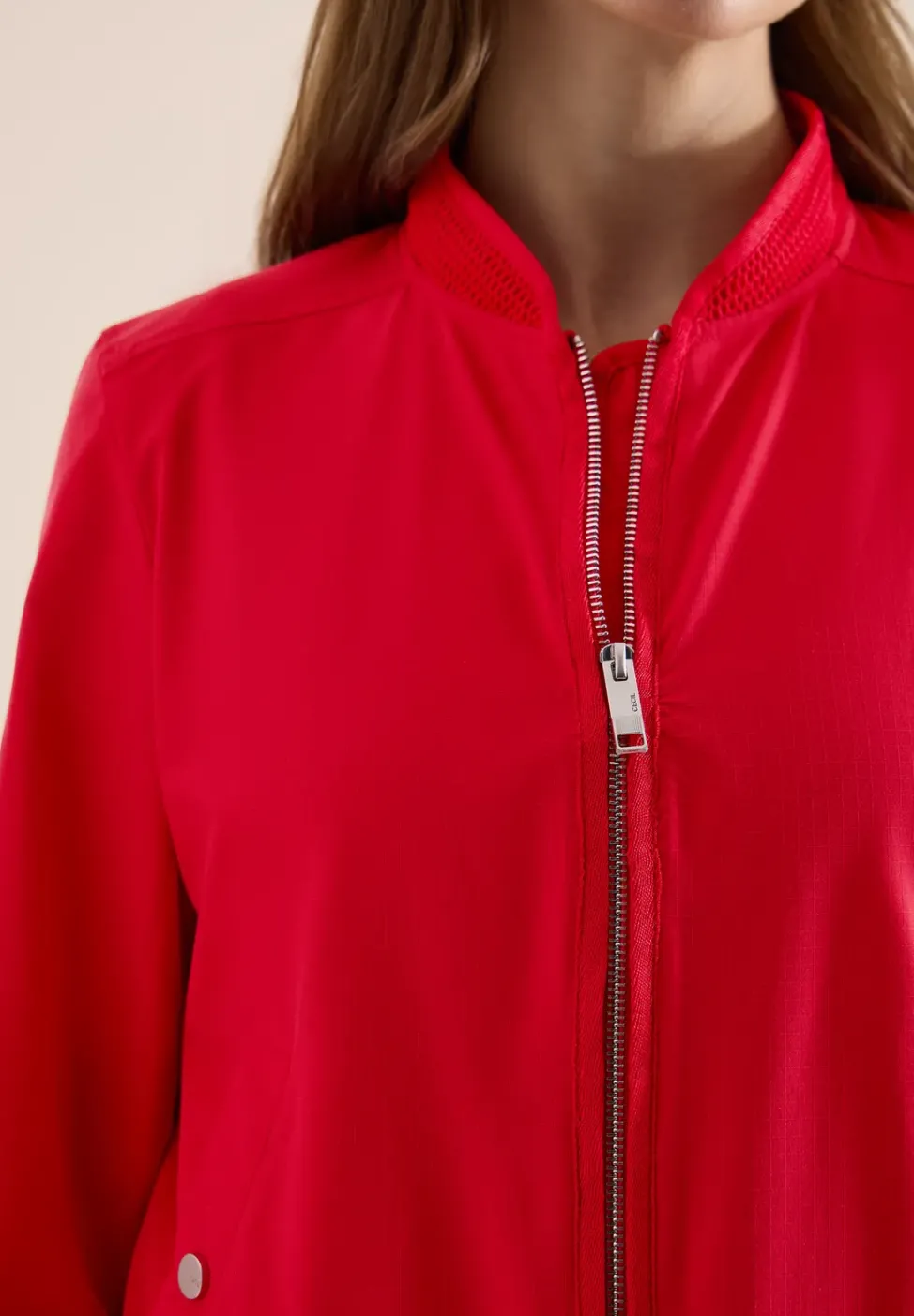 Blouson avec cordon de serrage et détails en mesh