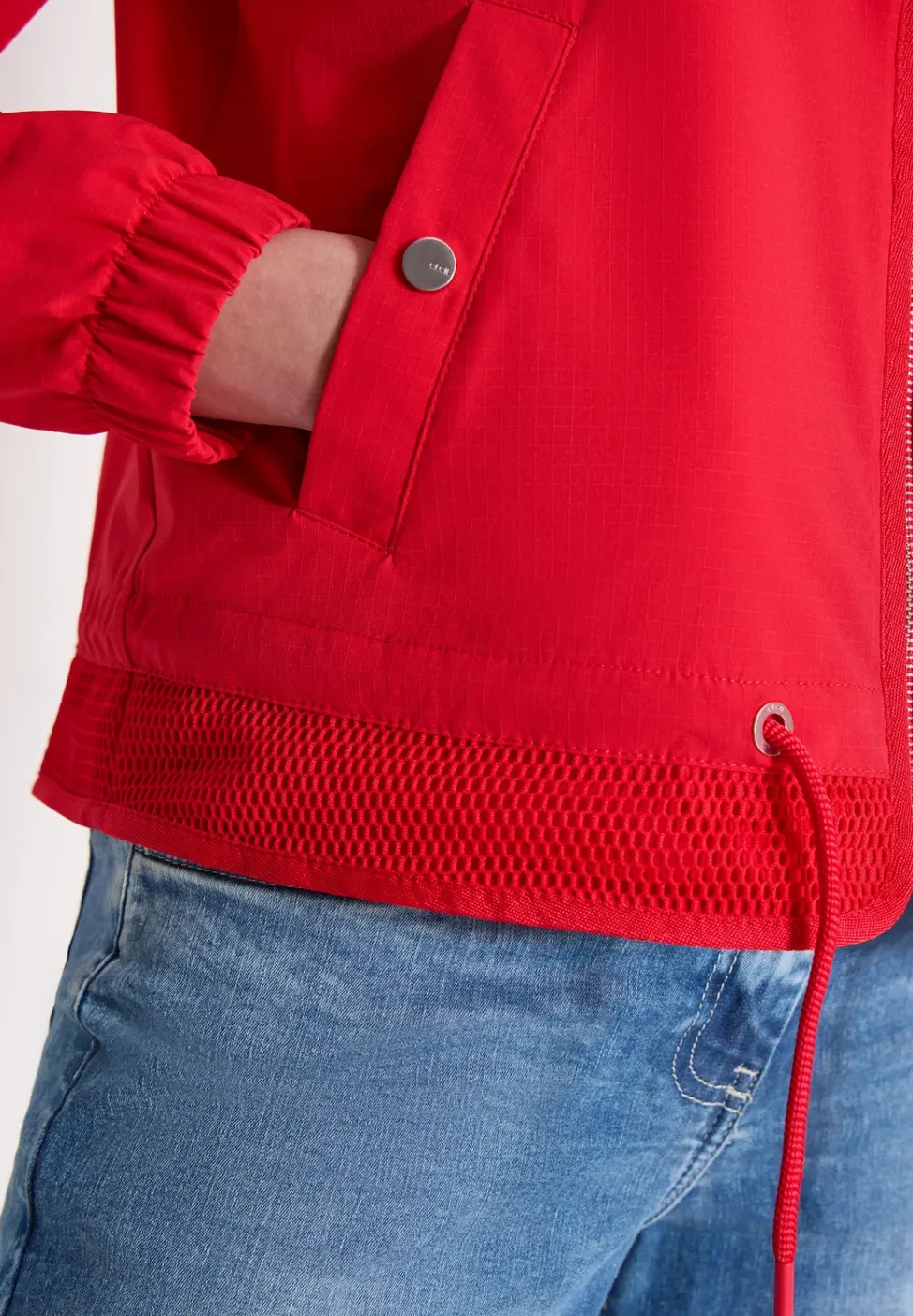 Blouson avec cordon de serrage et détails en mesh