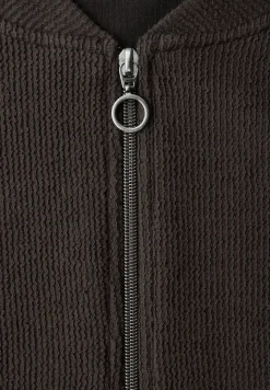 Blouson avec fermeture éclair et structure
