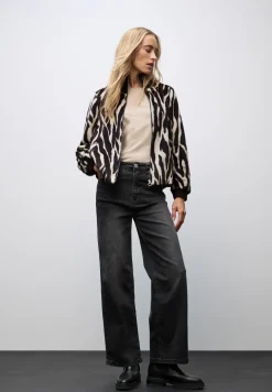 Blouson en fausse fourrure zébrée