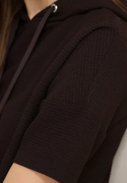 Chemise à capuche en couleur unie