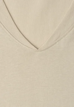 Chemise à épaules tombantes et col en V