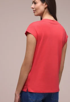 Chemise à épaules tombantes et col en V