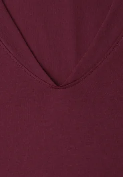 Chemise à épaules tombantes et col en V