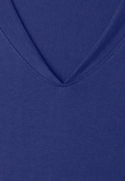 Chemise à épaules tombantes et col en V
