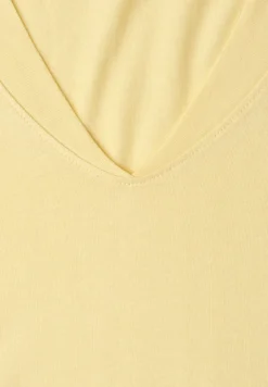 Chemise à épaules tombantes et col en V