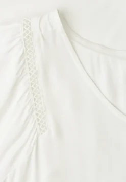 Chemise dropped shoulder avec col en V
