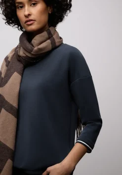 Chemise effet soyeux avec détails subtils