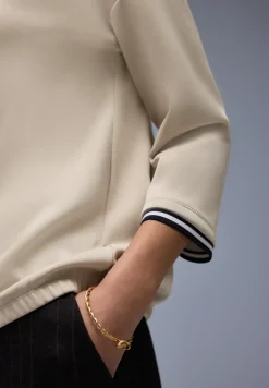 Chemise effet soyeux avec détails subtils