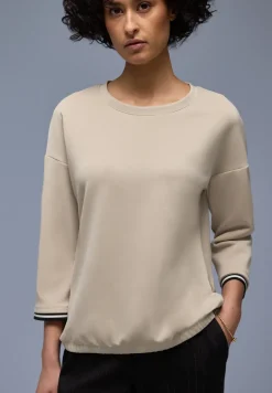 Chemise effet soyeux avec détails subtils