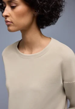 Chemise effet soyeux avec détails subtils