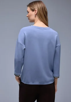 Chemise effet soyeux avec détails subtils