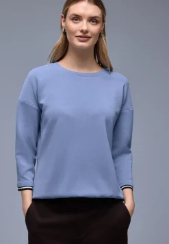 Chemise effet soyeux avec détails subtils
