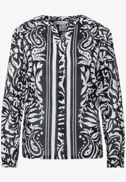 Chemisier avec mélange de motifs