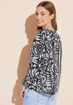 Chemisier avec mélange de motifs