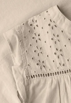 Chemisier top col fendu – détails shiffley