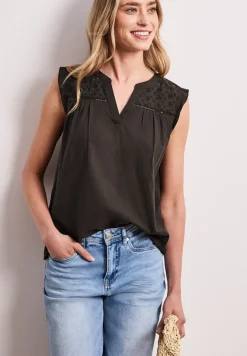 Chemisier top col fendu – détails shiffley