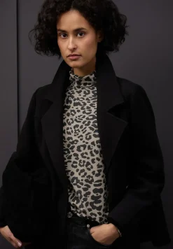 Col roulé à motifs