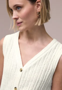 Gilet avec col en V et patte de boutonnage