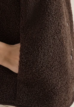 Gilet avec patte de boutonnage