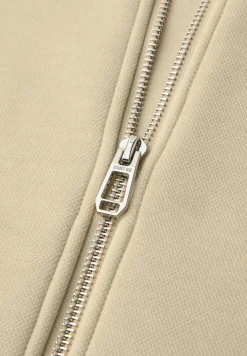 Gilet court avec cordon de serrage