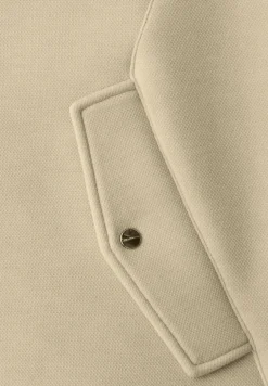Gilet court avec cordon de serrage