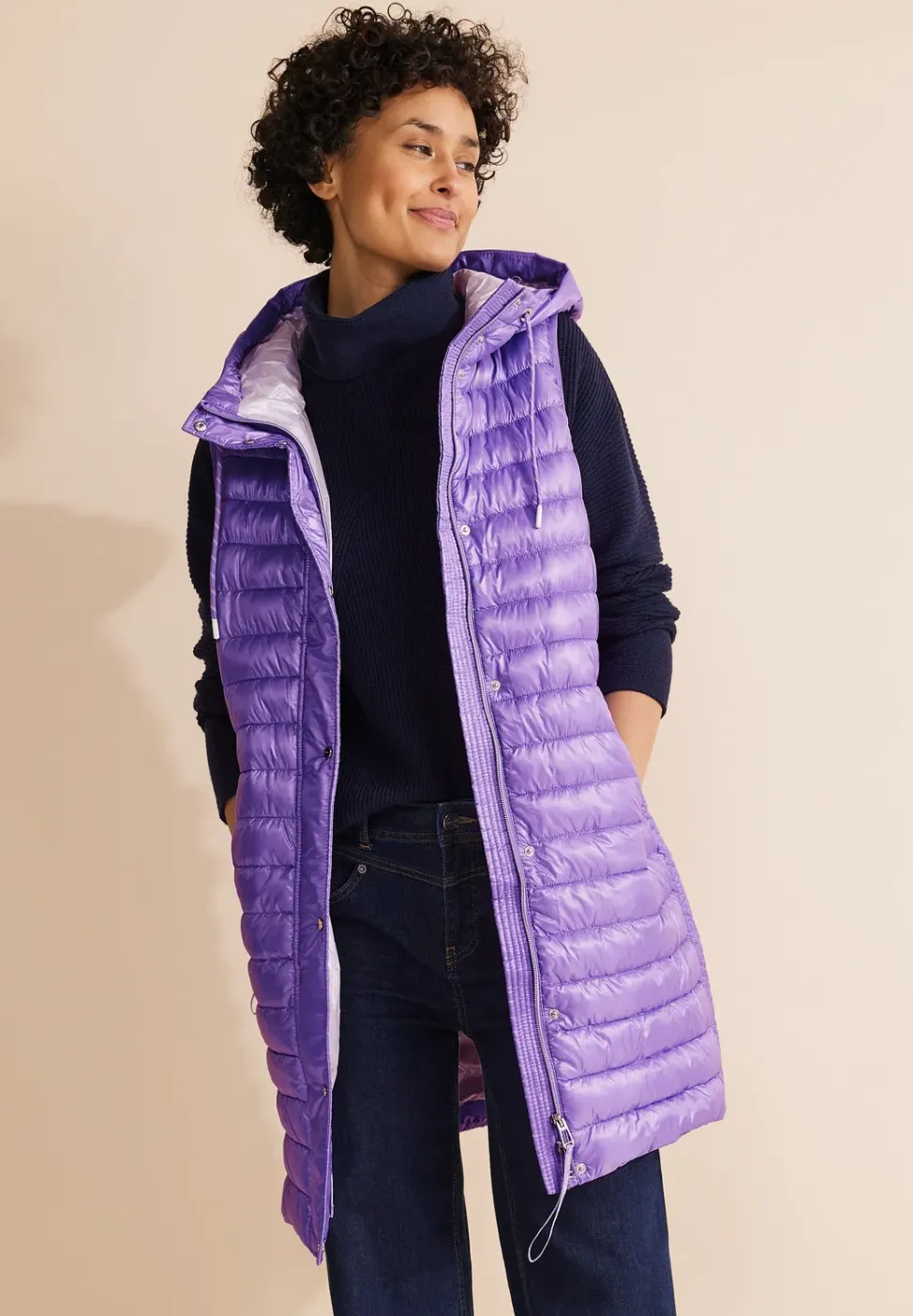 Gilet matelassé long à capuche