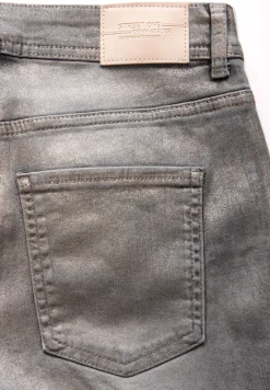 Jeans enduits