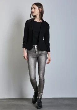 Jeans enduits